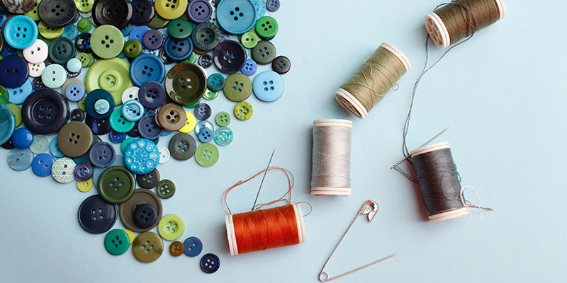 Sewing equipment such as buttons spools and pins