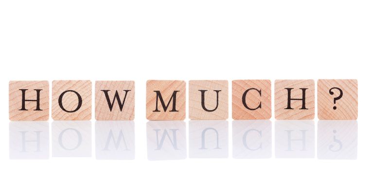 wooden blocks spelling the words how much