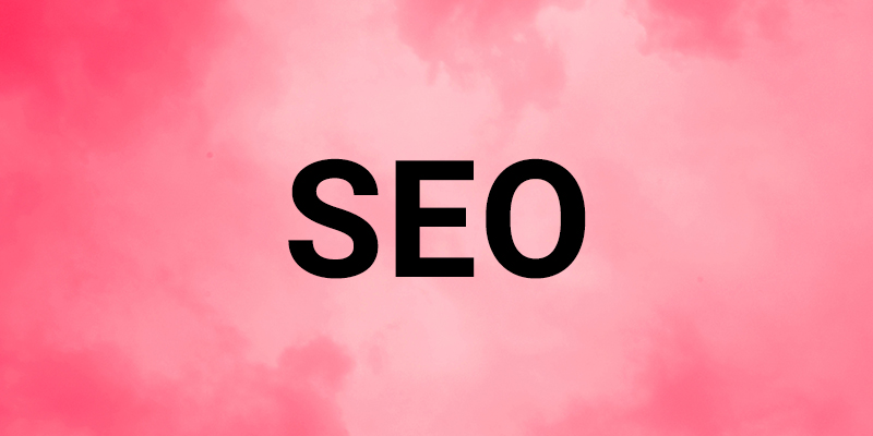 SEO written on a pink background