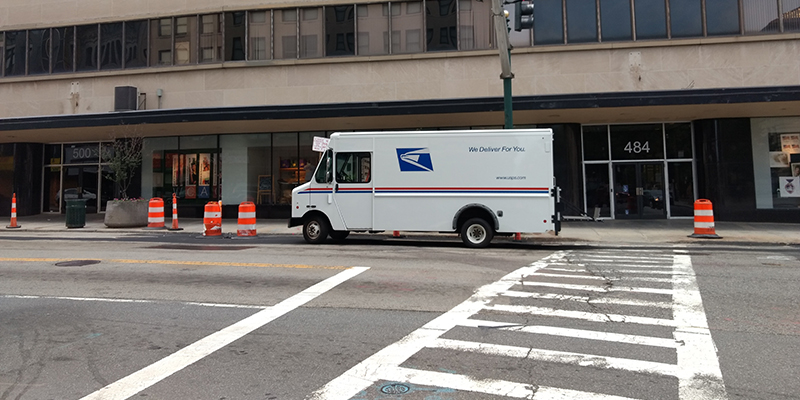 UPS van parked outside a building