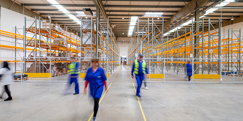 Walmart employees working in a warehouse