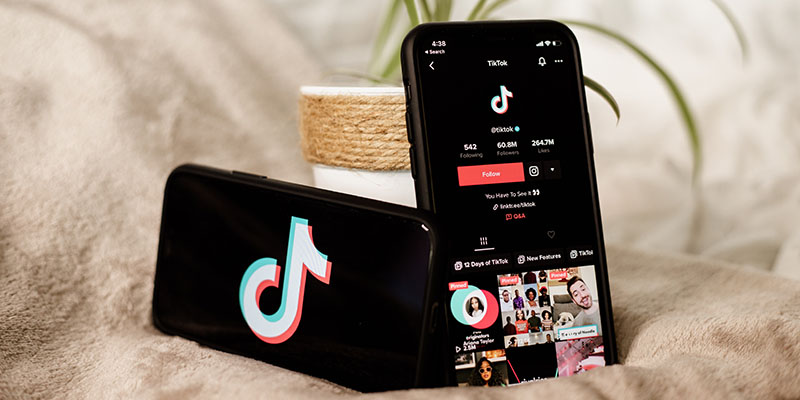 Two phone showing TikTok logo and a TikTok account