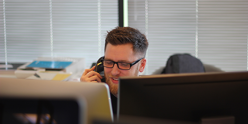 A man talking to someone on a cell phone