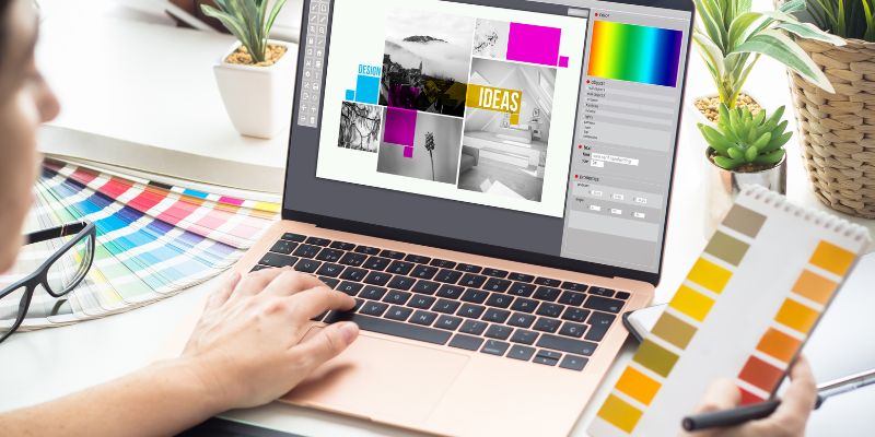 woman designing on a laptop