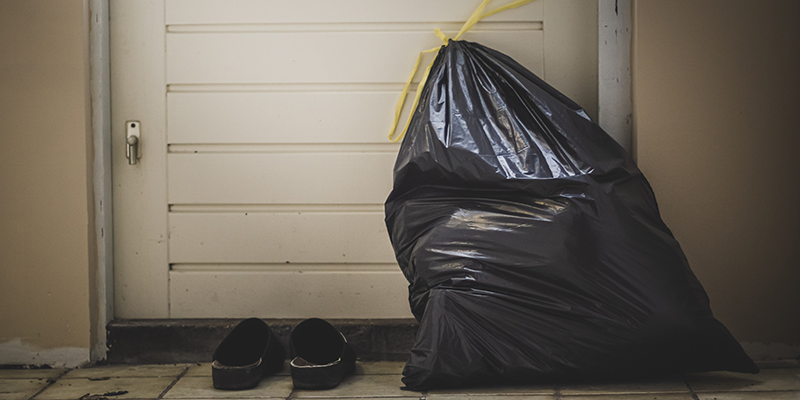 A garbage bag in the hallway