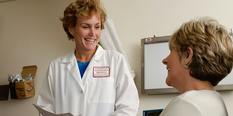 An oncologist talking to a patient