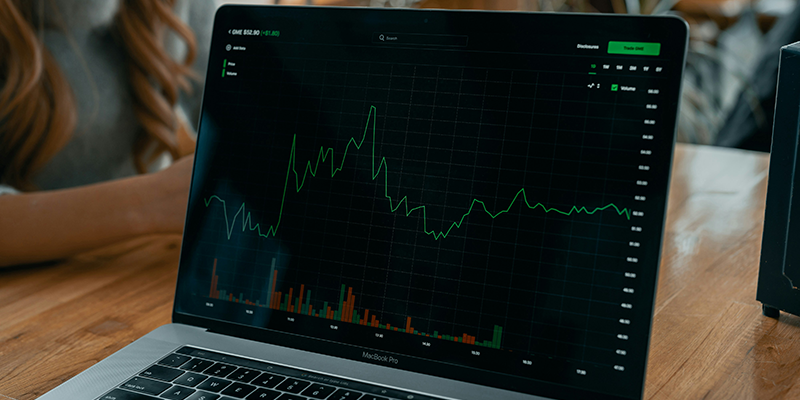 Stock market analysis on a laptop